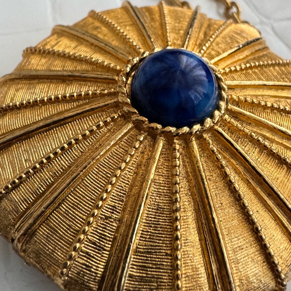 Vintage Estée Lauder solid perfume necklace